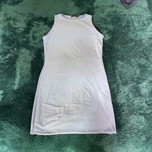 Light Purple Form Fitting Formal Dress in a size four.
